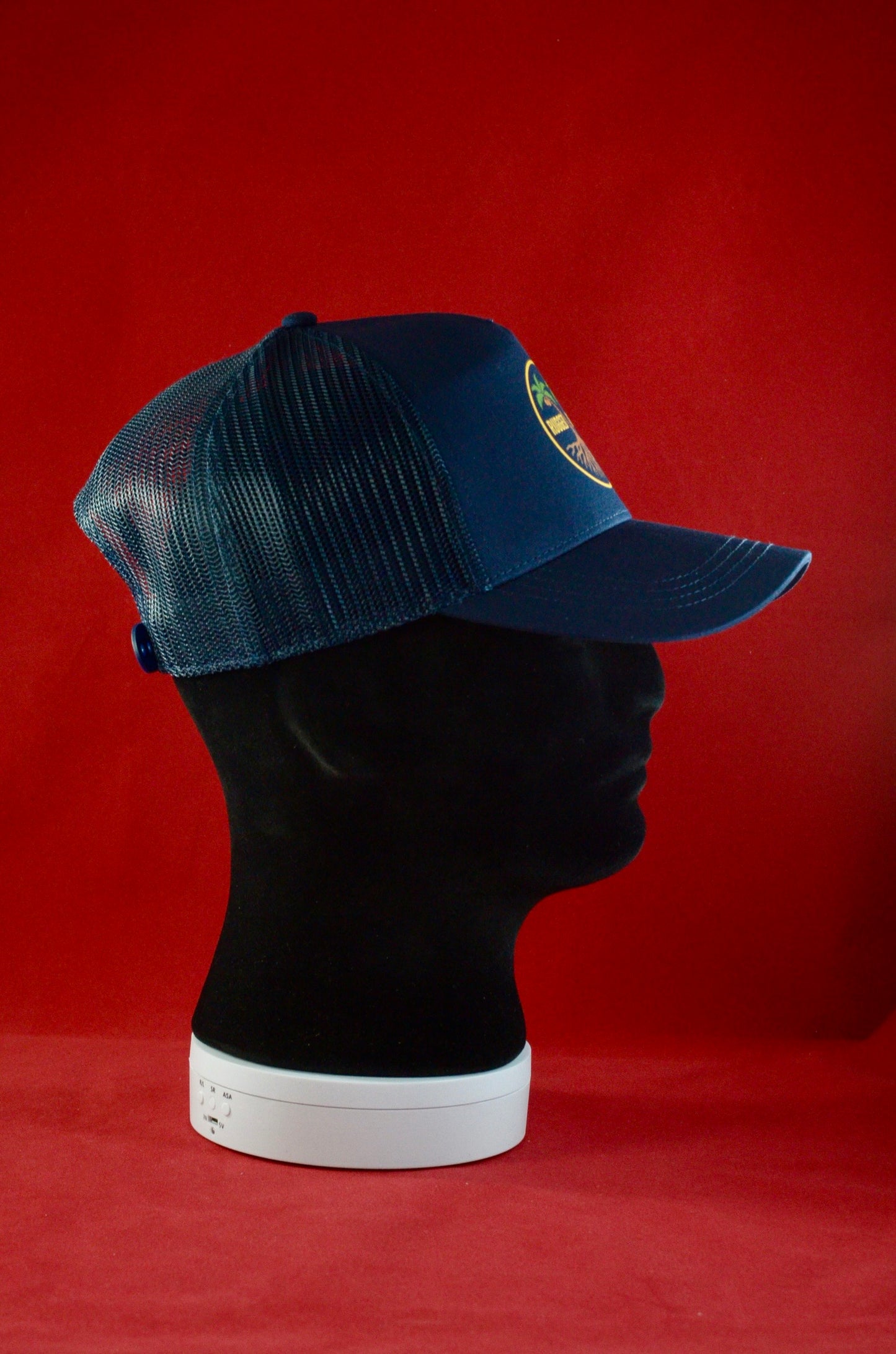 RUGGED ORIGINS Black / Navy Blue Trucker Hat - Coloured Logo