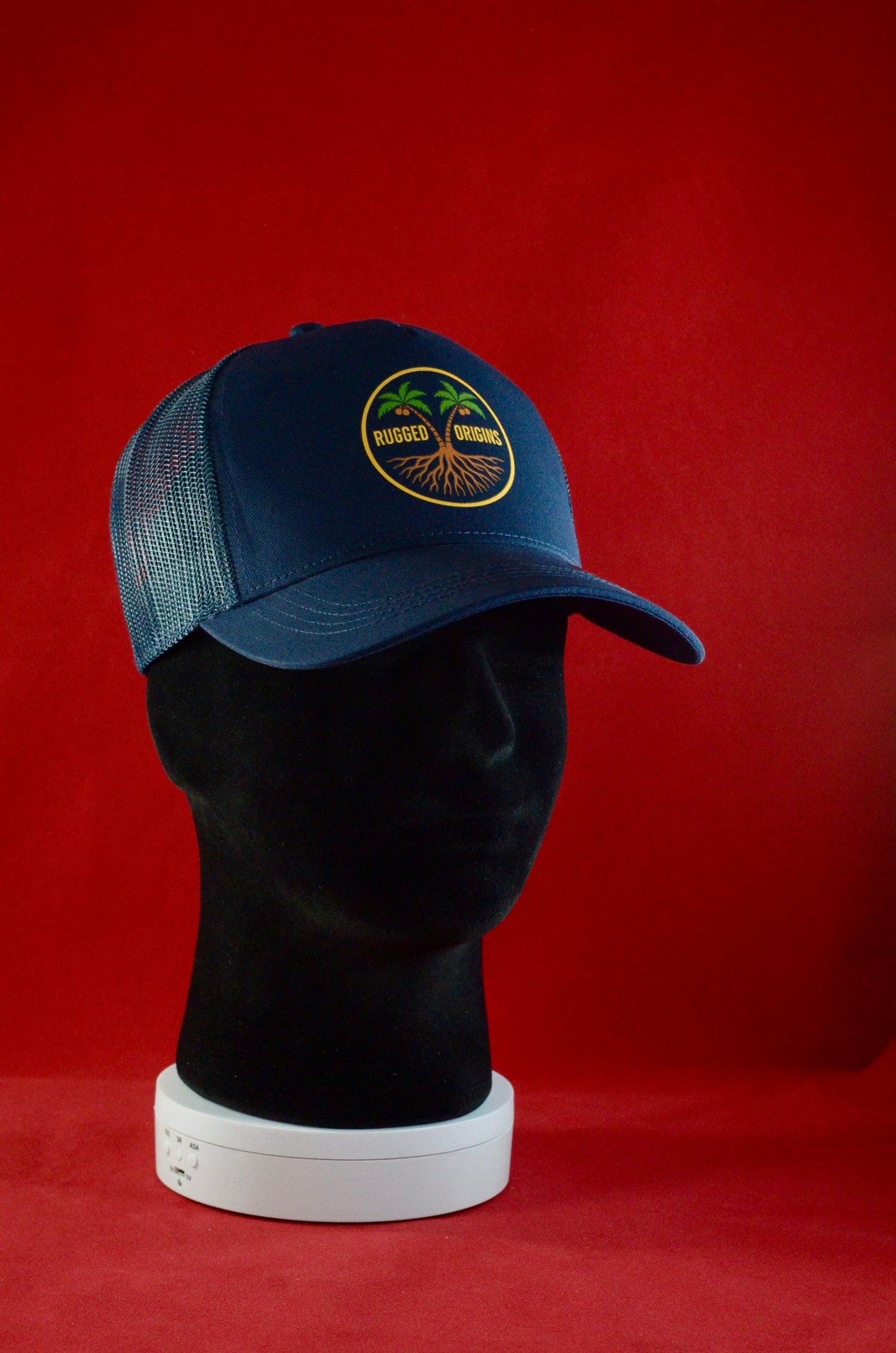 RUGGED ORIGINS Black / Navy Blue Trucker Hat - Coloured Logo