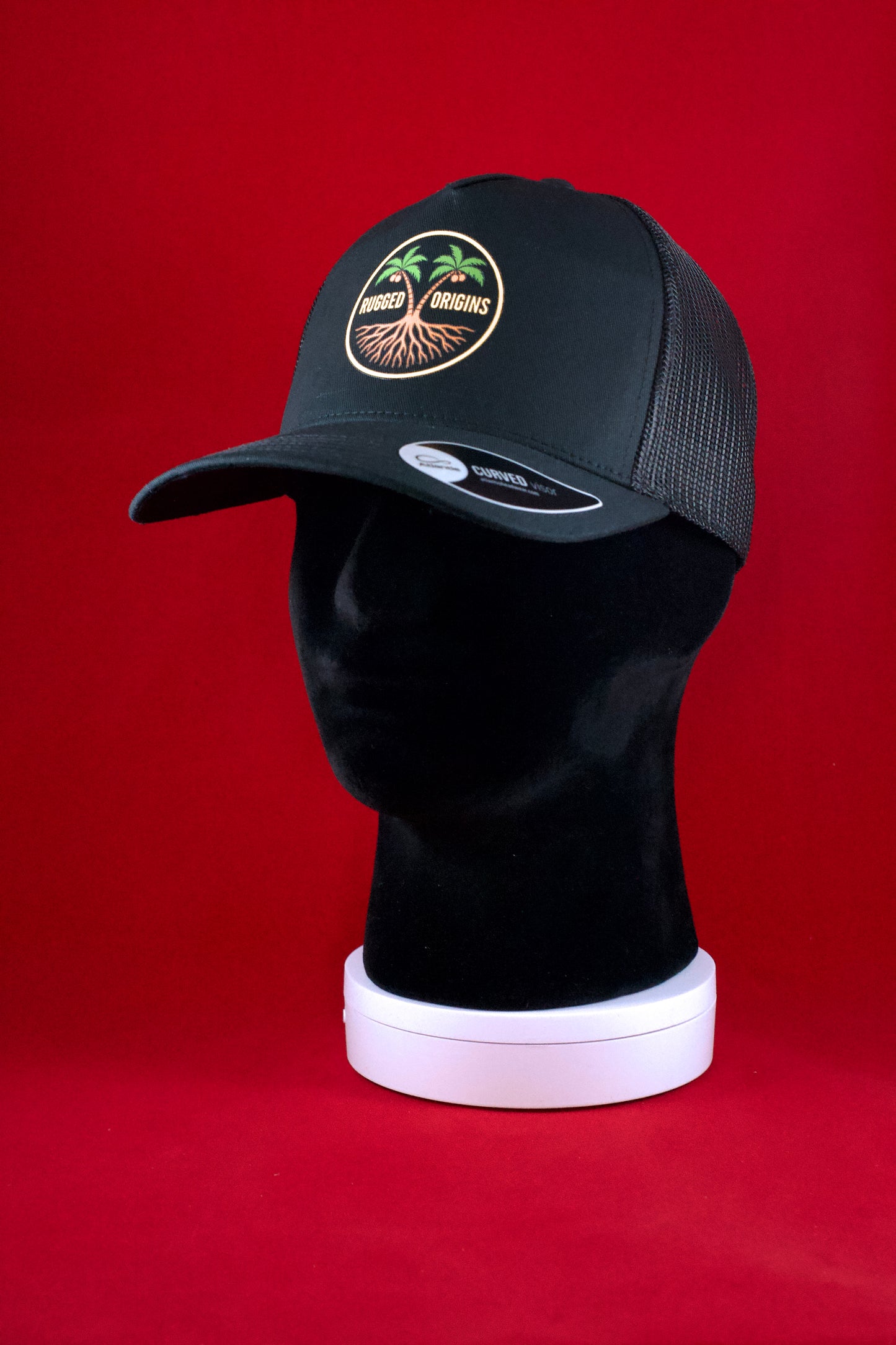 RUGGED ORIGINS Black / Navy Blue Trucker Hat - Coloured Logo