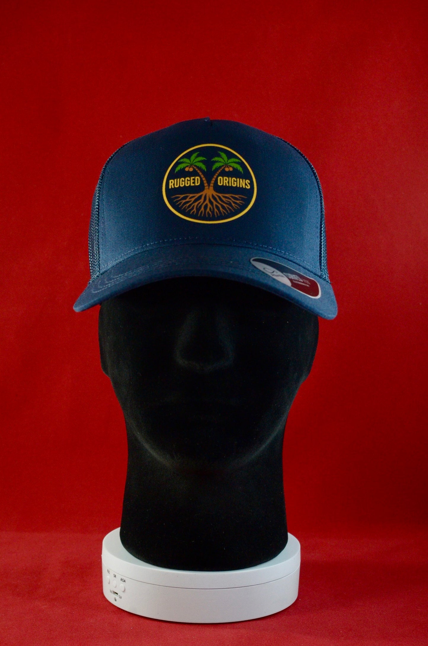 RUGGED ORIGINS Black / Navy Blue Trucker Hat - Coloured Logo