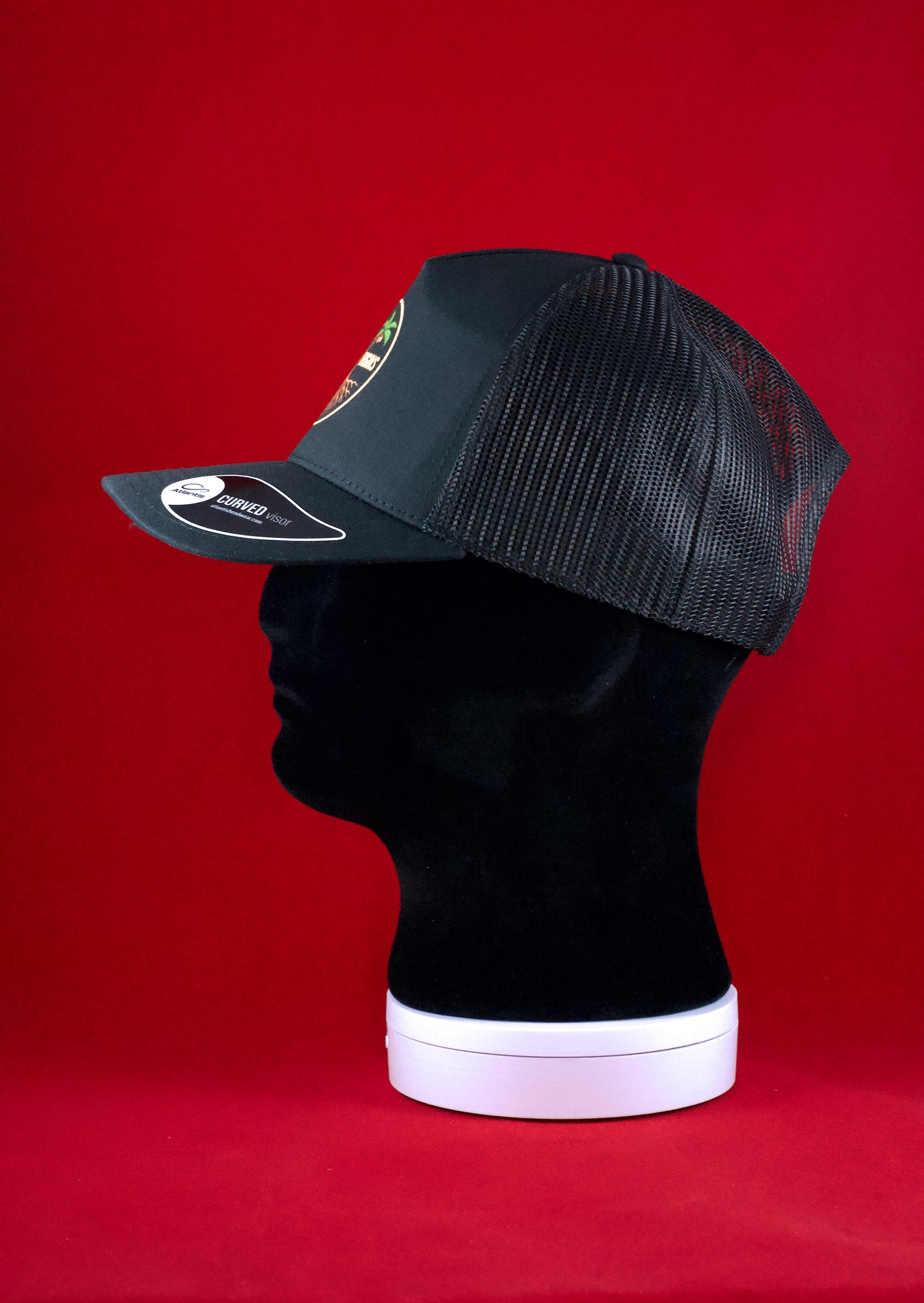 RUGGED ORIGINS Black / Navy Blue Trucker Hat - Coloured Logo