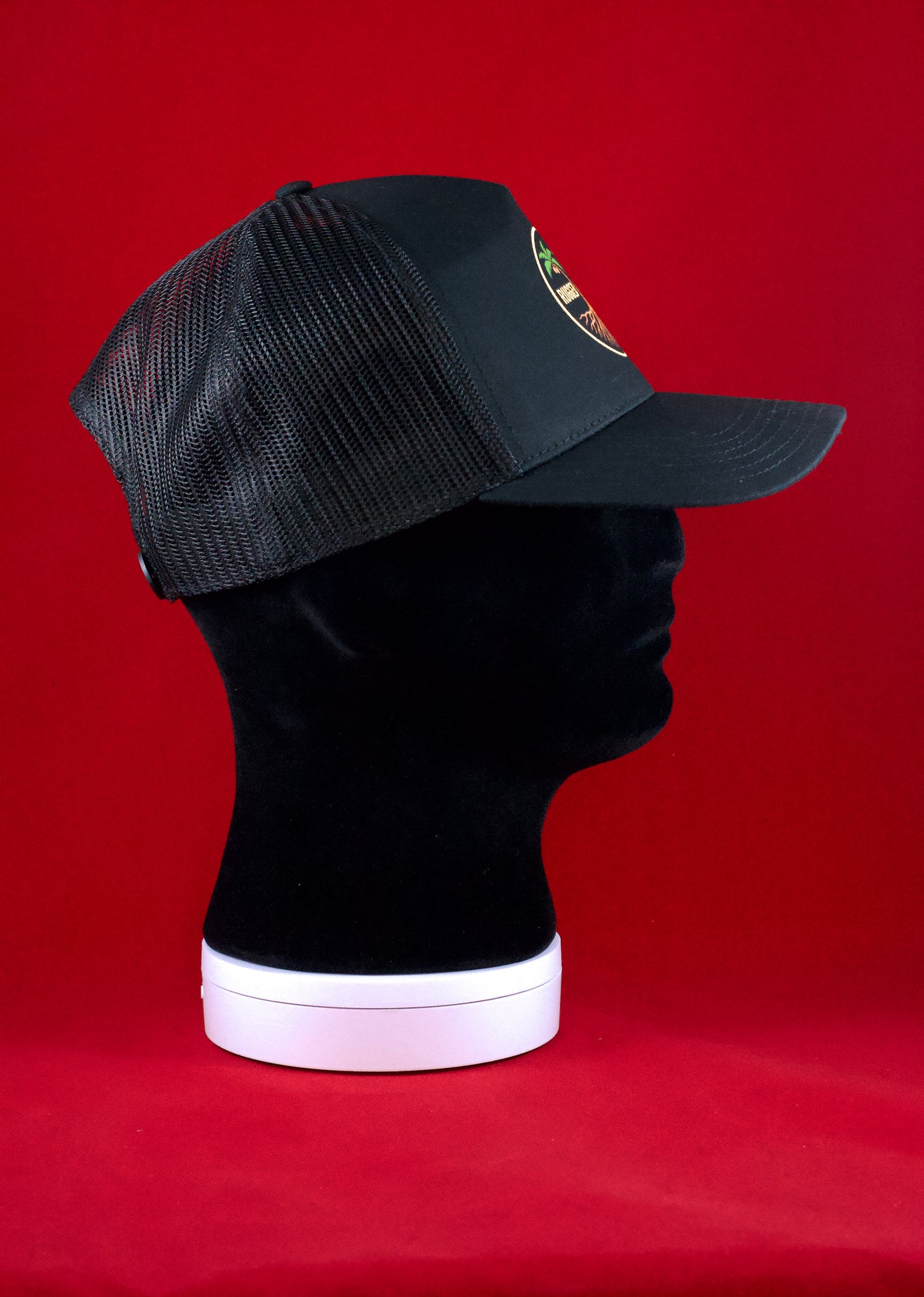 RUGGED ORIGINS Black / Navy Blue Trucker Hat - Coloured Logo