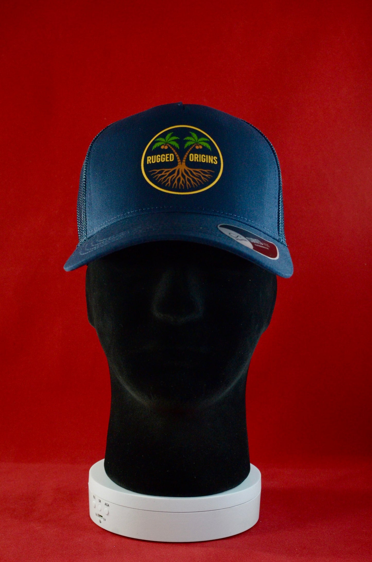 RUGGED ORIGINS Black / Navy Blue Trucker Hat - Coloured Logo
